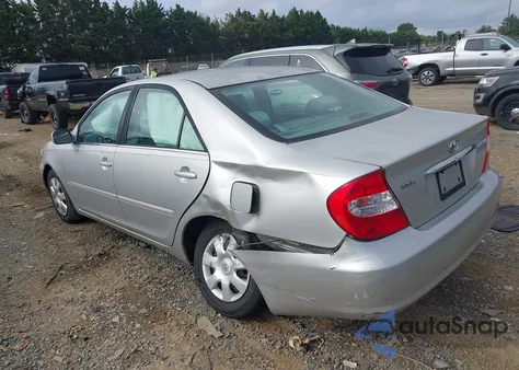 2004 Toyota Camry Le z USA, uszkodzony, nr VIN 4T1BE30K64U935692